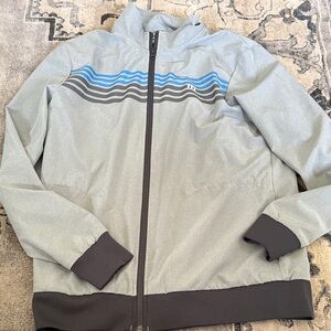 TravisMathew Light Gray Jacket with Blue and Black Stripe Detail